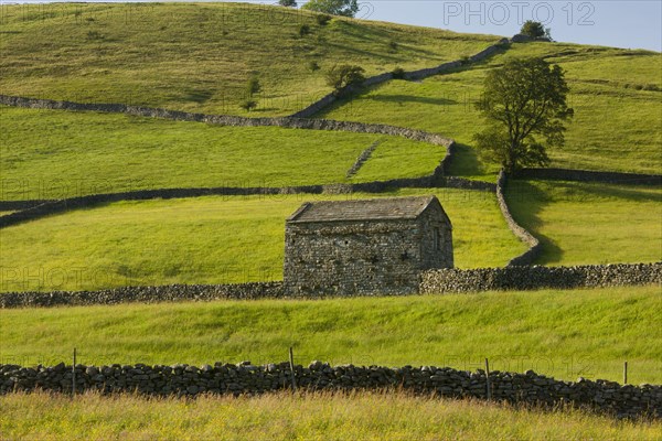View of stone barn and drystone walls