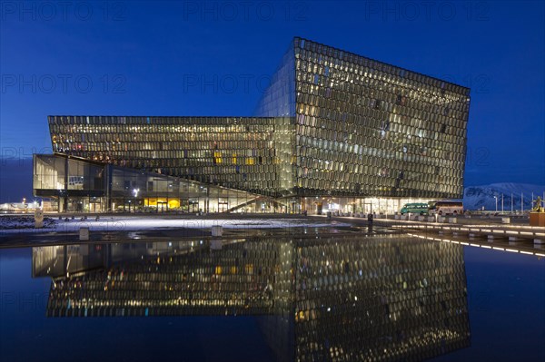 Harpa Concert Hall and Conference Centre illuminated at night in Reykjavik