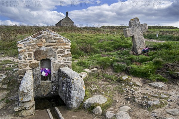 Saint well and stone cross at Saint Samson Chapel