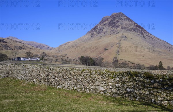 View over dry stone wall towards Fallen