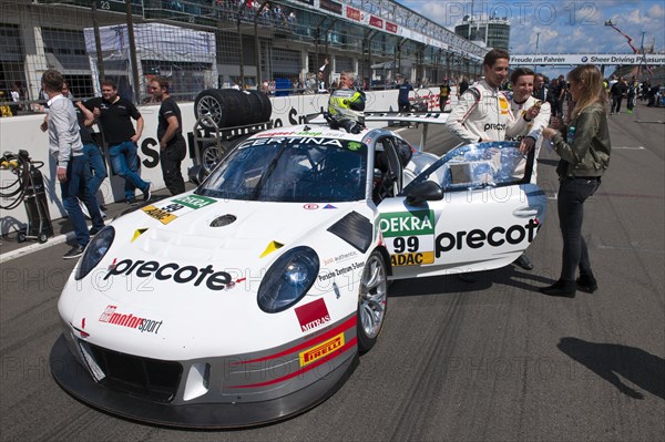 Porsche GT3 R race car in grid lane