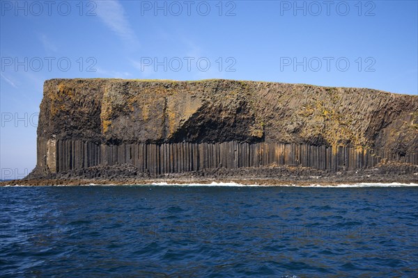 View of coastline with cliffs and columnar basalt rocks