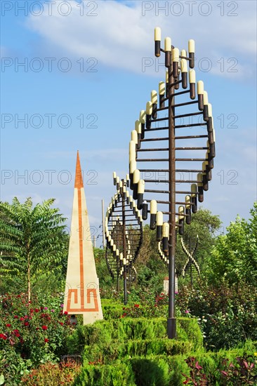 Granite obelisk and lamppost