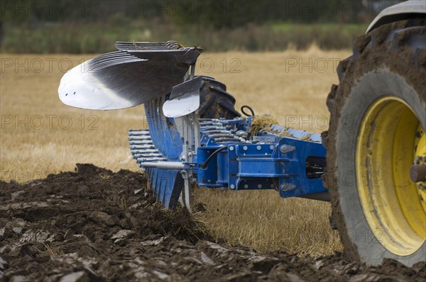 Close-up of an eight-furrow reversible plough