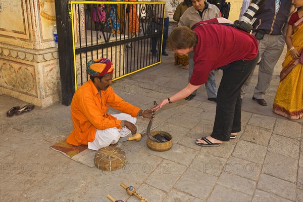 Snake charmer with cobra