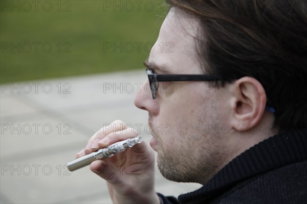 Man with e-cigarette