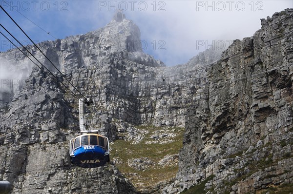 Cable car and mountain cliffs