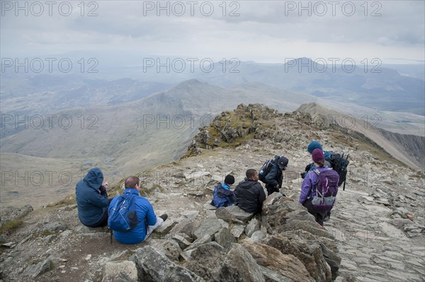 Walkers near the top of the mountain