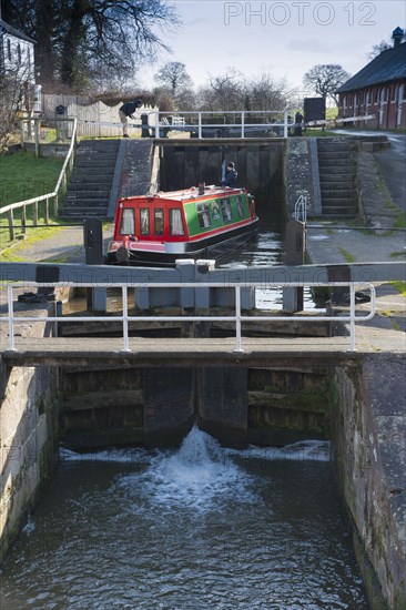 Narrowboat passing through the canal lock