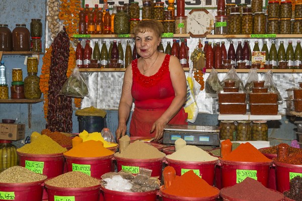 Georgian woman selling spices