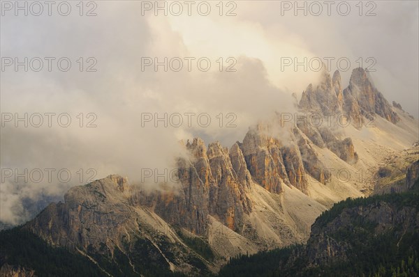 View of mountain range in low cloud