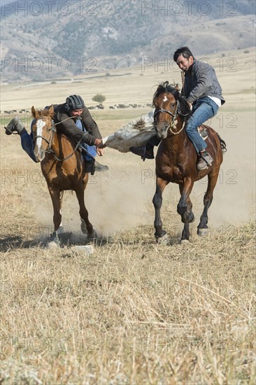 Traditional Kokpar or Buzkashi in the outskirts of Gabagly National Park