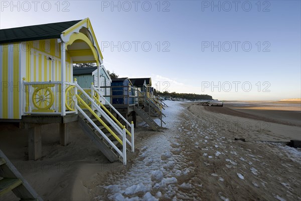 View of beach huts in the snow