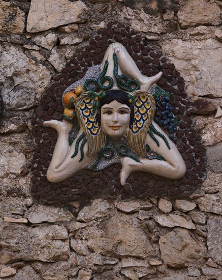 Trinacria on a wall