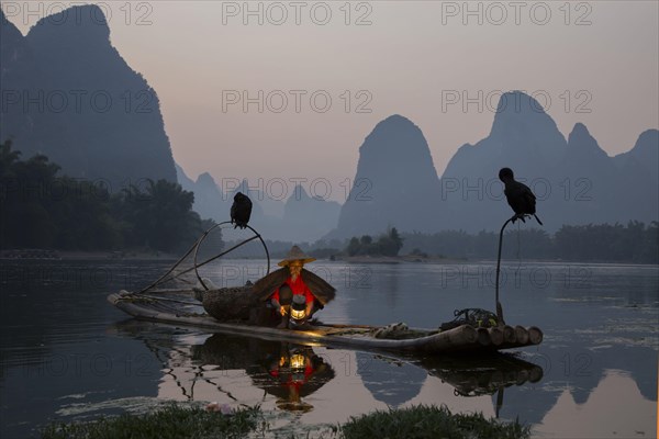 Traditional fisherman with trained cormorants