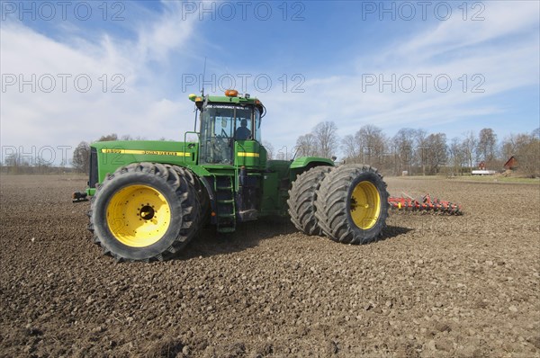 John Deere 9400 Tractor with Harrows