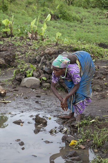 Pygmy woman with child