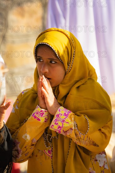 Woman during the Friday Goat Market in Nizwa