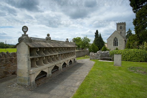 Mid-19th century stone bee house with 33 galleries to house straw bee skeps