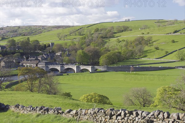 View of a five-arched stone bridge over the River Wharfe