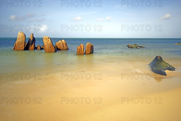 Granite rocks in the sea in the early morning