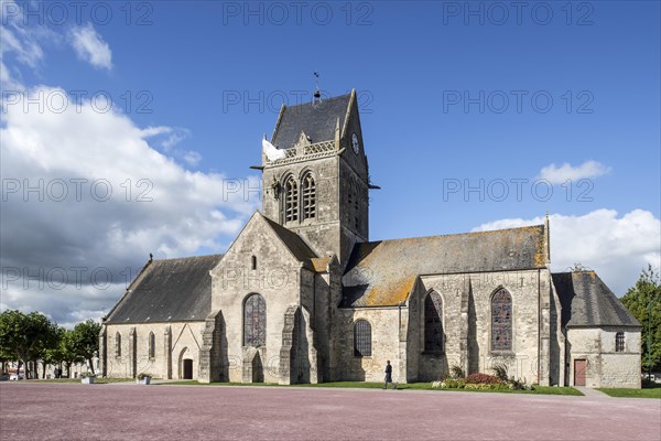 Church of Sainte-Mere-Eglise with parachute memorial in honour of paratrooper John Steele