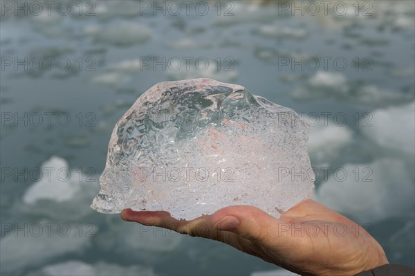 Holding a block of ice