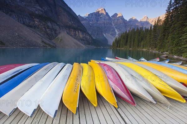 Colourful canoes at Moraine Lake in the Valley of the Ten Peaks