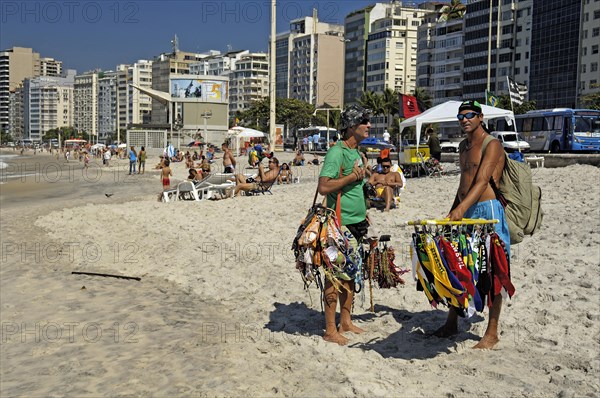 Flying traders on Copacabana beach