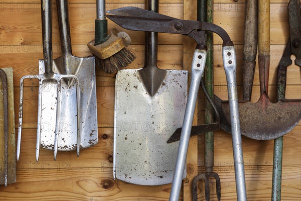 Garden tools in garden arbour