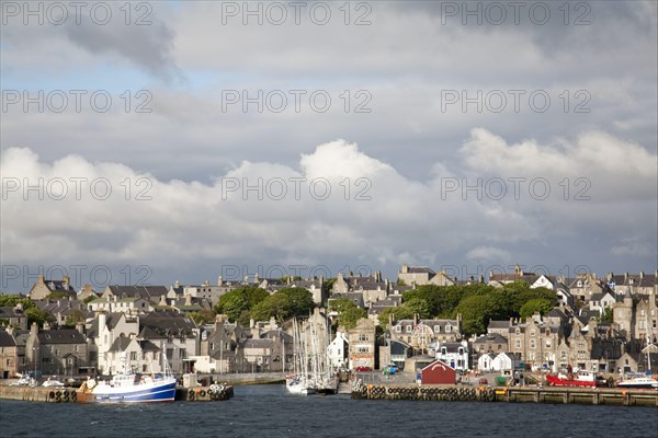 View of coastal harbour and town