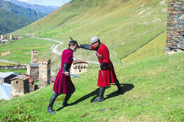 Dagger fighting demonstration by two Georgian men of a folklore group