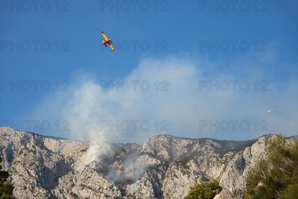 Firefighting aircraft in forest fire