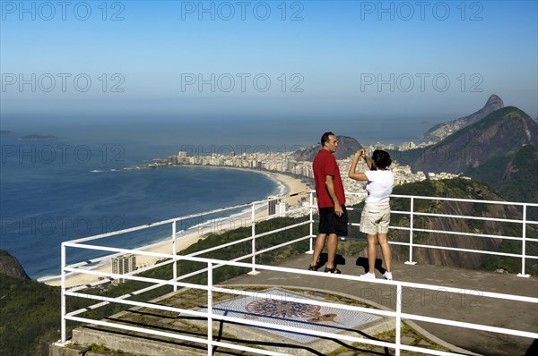 Tourists enjoying the view on Sugar Loaf Mountain