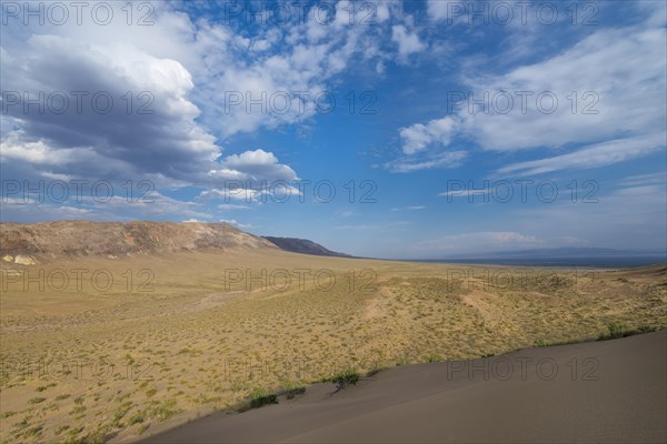 Aktau Mountains seen from the Singing Dunes