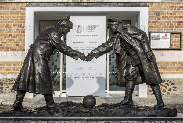 Statue by Andrew Edwards depicting British and German soldiers shaking hands during the Christmas truce in World War I