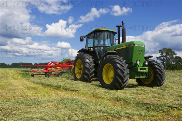 John Deere 4455 tractor and double turner