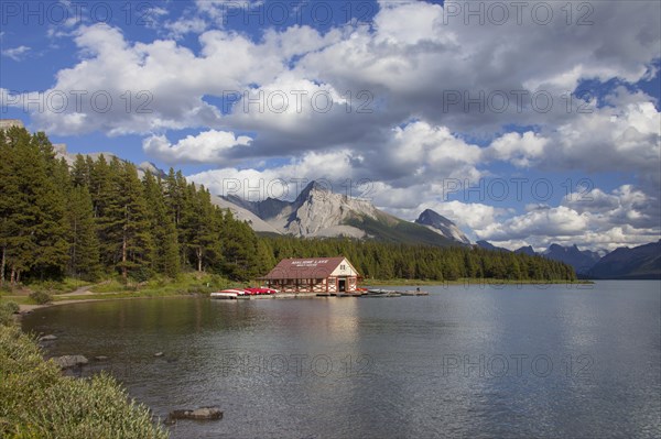 Boathouse with canoes at Maligne Lake