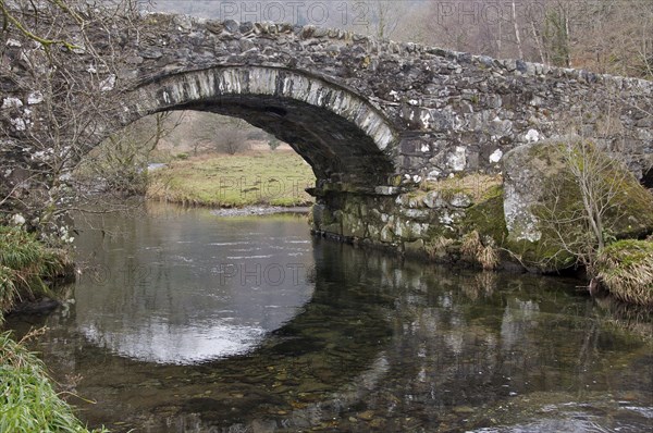 Stone bridge over river