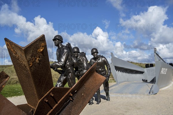 Czech hedgehog and landing craft in front of the Musee du Debarquement Utah Beach