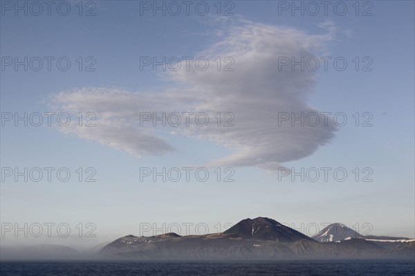 View of the volcanic island coast at dawn