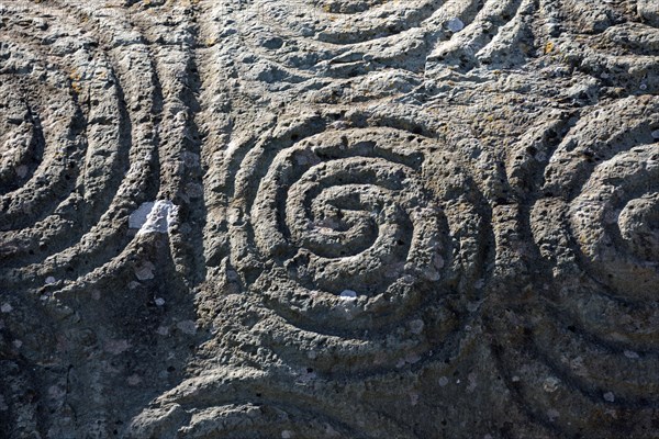 Decorated stone block at the entrance to the burial chamber