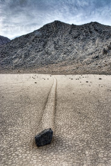 'Sailing stones' geological phenomenon of rocks moving along tracks on valley floor