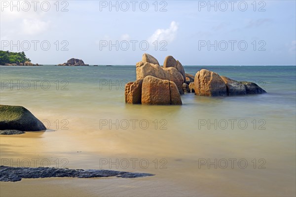 Granite rocks in the sea in the early morning