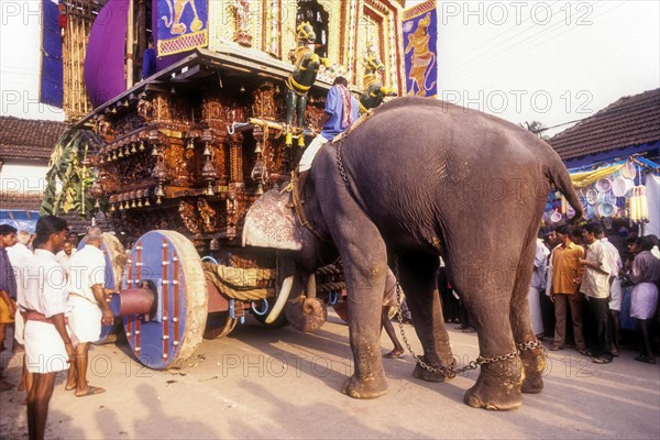 Elephant pushing the chariot in Radhotsavam or temple chariot festival in Kalpathy near Palakkad