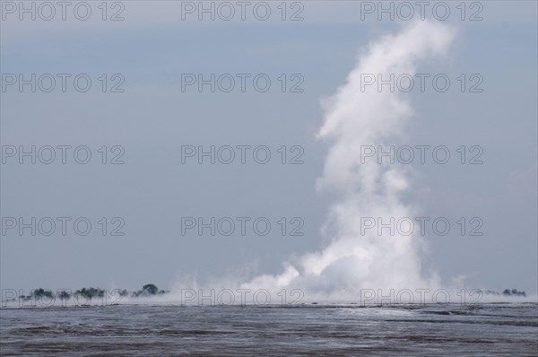 Mud river geyser and mud lake of the mud volcano