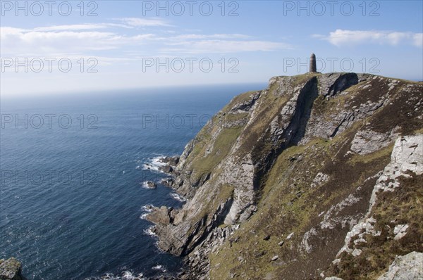 View of coastal cliffs and commemorative monument