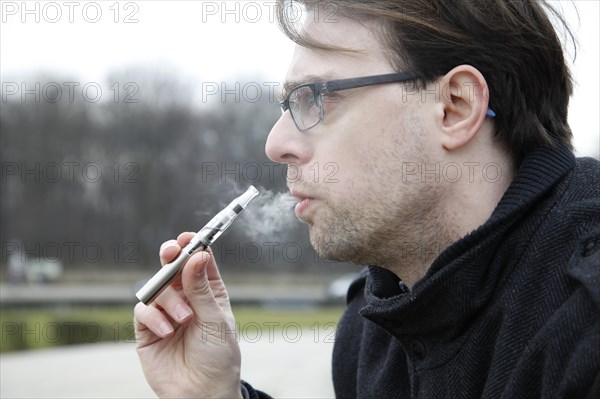 Man with e-cigarette