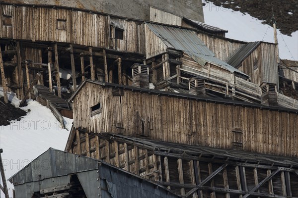 Dilapidated buildings of an abandoned former coal mine in Longyearbyen