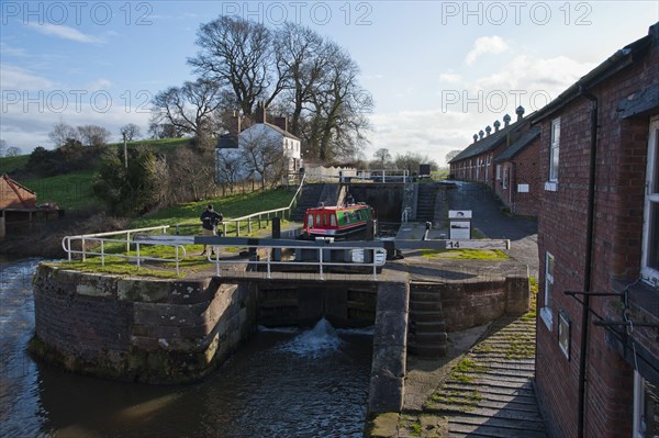 Narrowboat passing through the canal lock